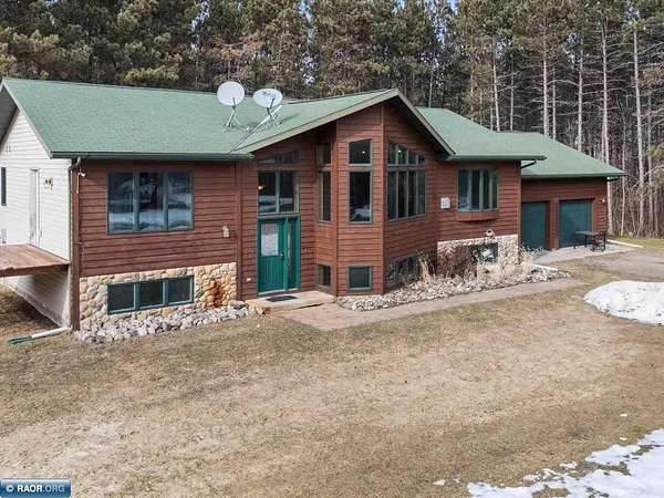 10 Acres of Recreational Land with Home for Sale in Bovey, Minnesota