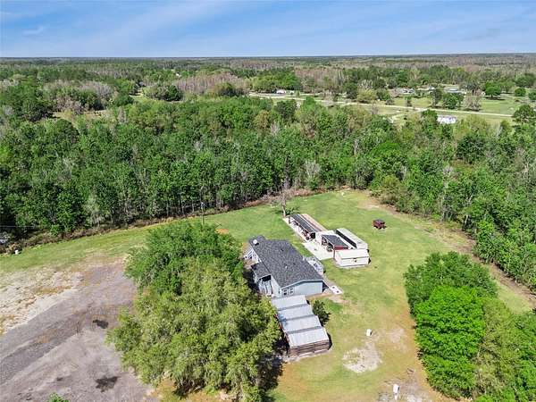 3.4 Acres of Land with Home for Sale in Polk City, Florida