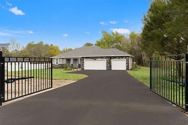 2 Acres of Land with Home for Sale in Spring Hill, Florida