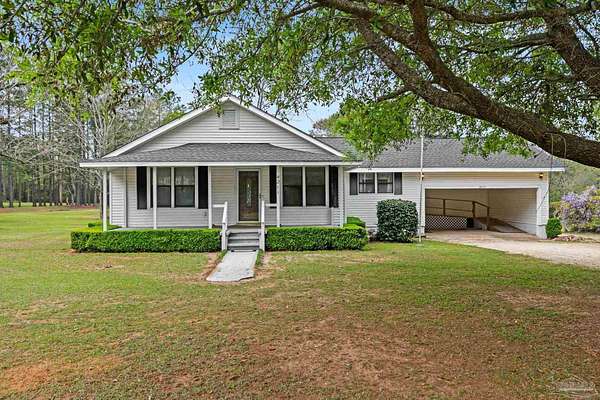 1.69 Acres of Land with Home for Sale in Century, Florida