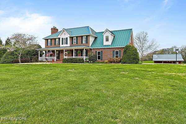 11.4 Acres of Land with Home for Sale in Strawberry Plains, Tennessee