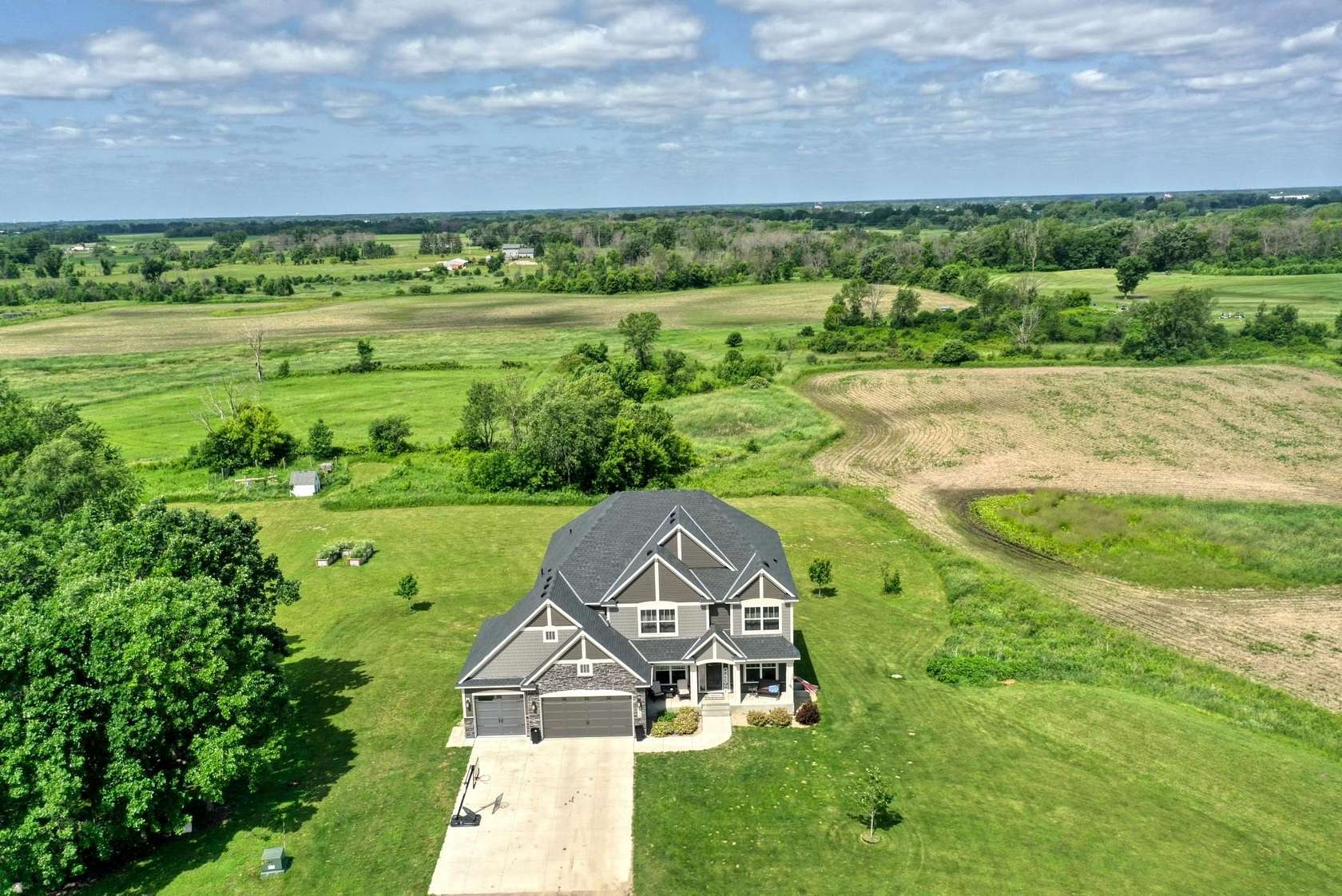 76.6 Acres of Land with Home for Sale in Forest Lake, Minnesota