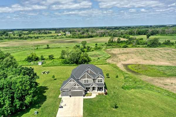 76.6 Acres of Land with Home for Sale in Forest Lake, Minnesota