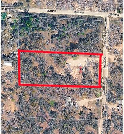 2.62 Acres of Land with Home for Sale in Quinlan, Texas