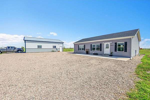 35 Acres of Agricultural Land with Home for Sale in Nunn, Colorado