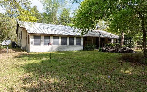 10.5 Acres of Land with Home for Sale in Live Oak, Florida