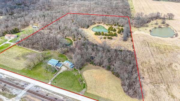 15 Acres of Recreational Land with Home for Sale in Holliday, Missouri