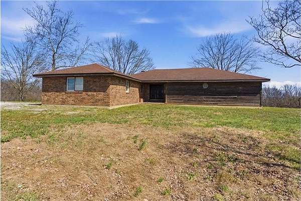 15 Acres of Land with Home for Sale in Excelsior Springs, Missouri