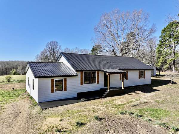 19.4 Acres of Land with Home for Sale in Fremont, Missouri