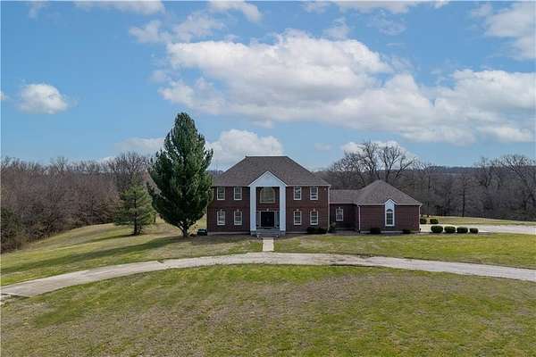 16.7 Acres of Land with Home for Sale in Warrensburg, Missouri