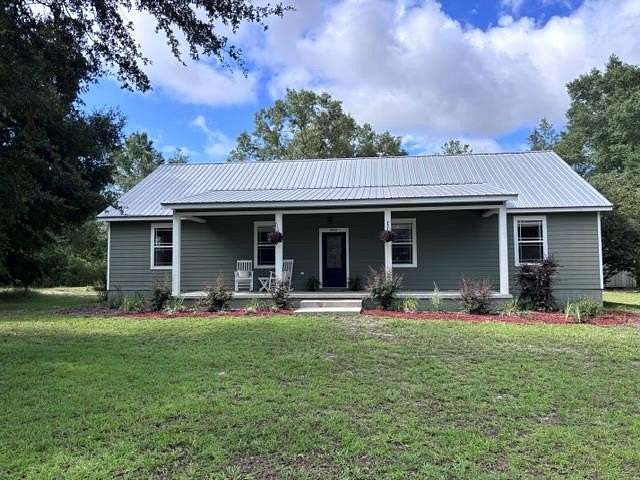 3 Acres of Land with Home for Sale in Chiefland, Florida