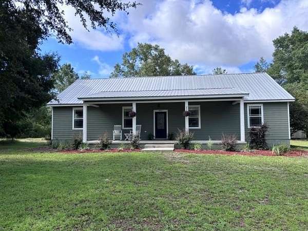 3 Acres of Land with Home for Sale in Chiefland, Florida