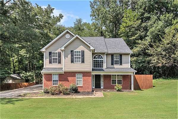 1.57 Acres of Land with Home for Sale in Sharpsburg, Georgia