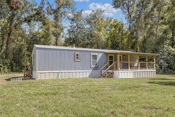 1.56 Acres of Land with Home for Sale in Fort White, Florida