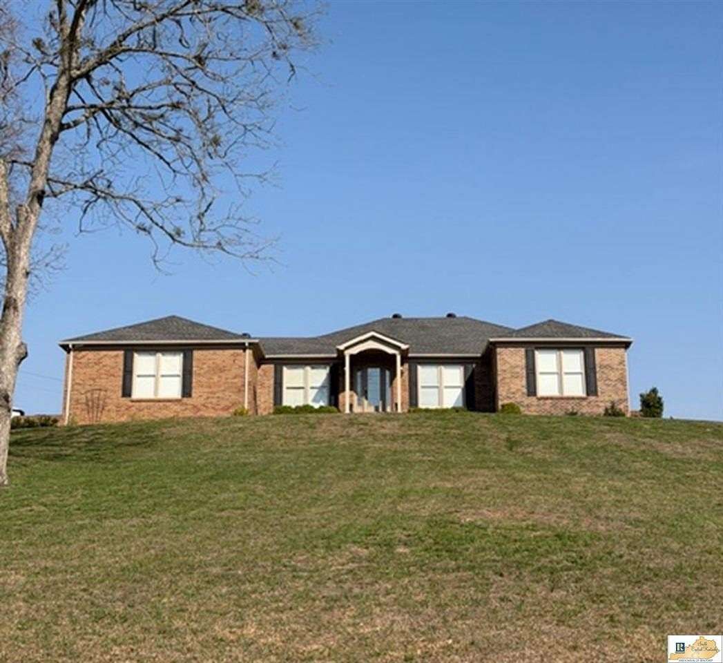 3.28 Acres of Land with Home for Sale in Tompkinsville, Kentucky