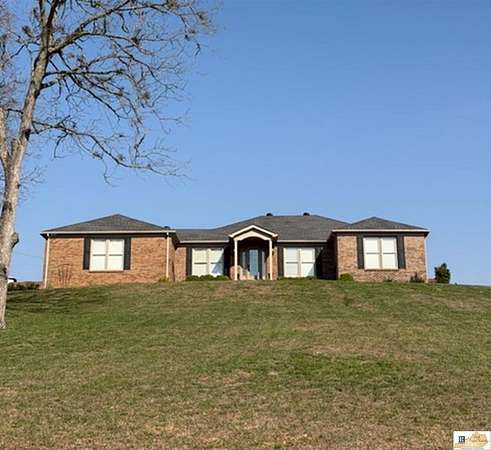 3.28 Acres of Land with Home for Sale in Tompkinsville, Kentucky