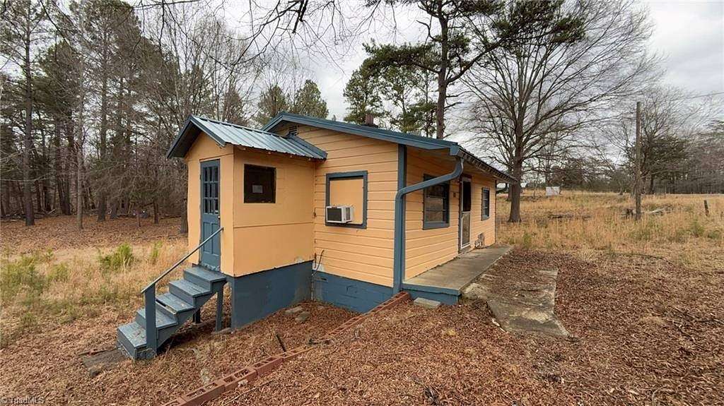 3.14 Acres of Land with Home for Sale in Burlington, North Carolina