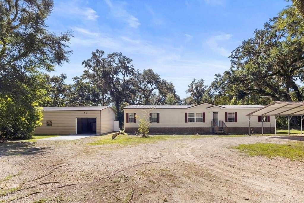 5.5 Acres of Land with Home for Sale in Old Town, Florida