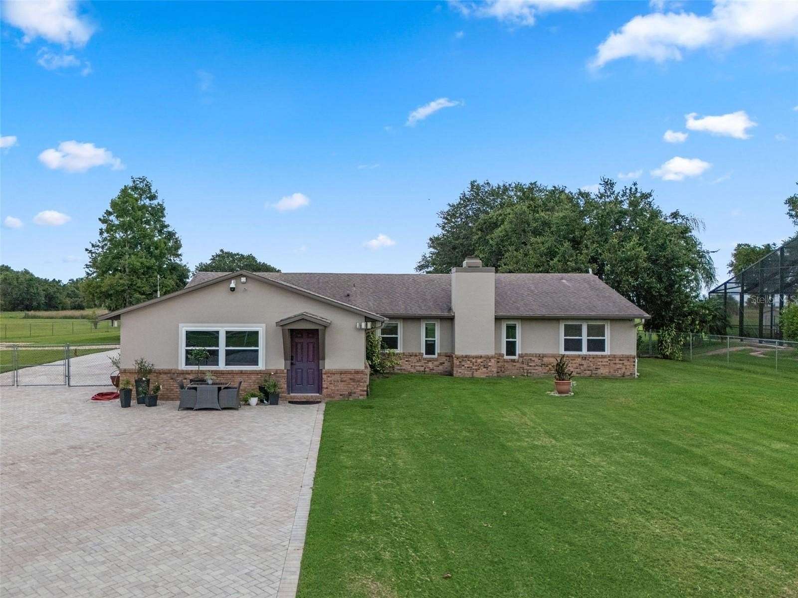 2.32 Acres of Land with Home for Sale in Kissimmee, Florida