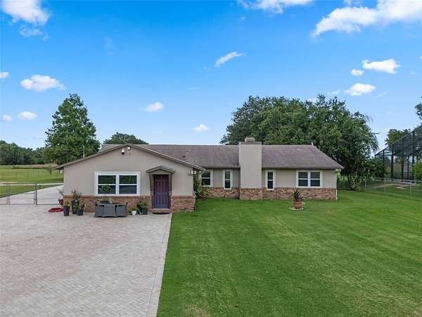 2.32 Acres of Land with Home for Sale in Kissimmee, Florida