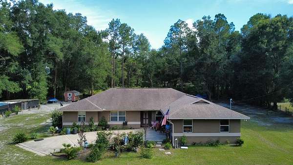 1.84 Acres of Land with Home for Sale in Williston, Florida