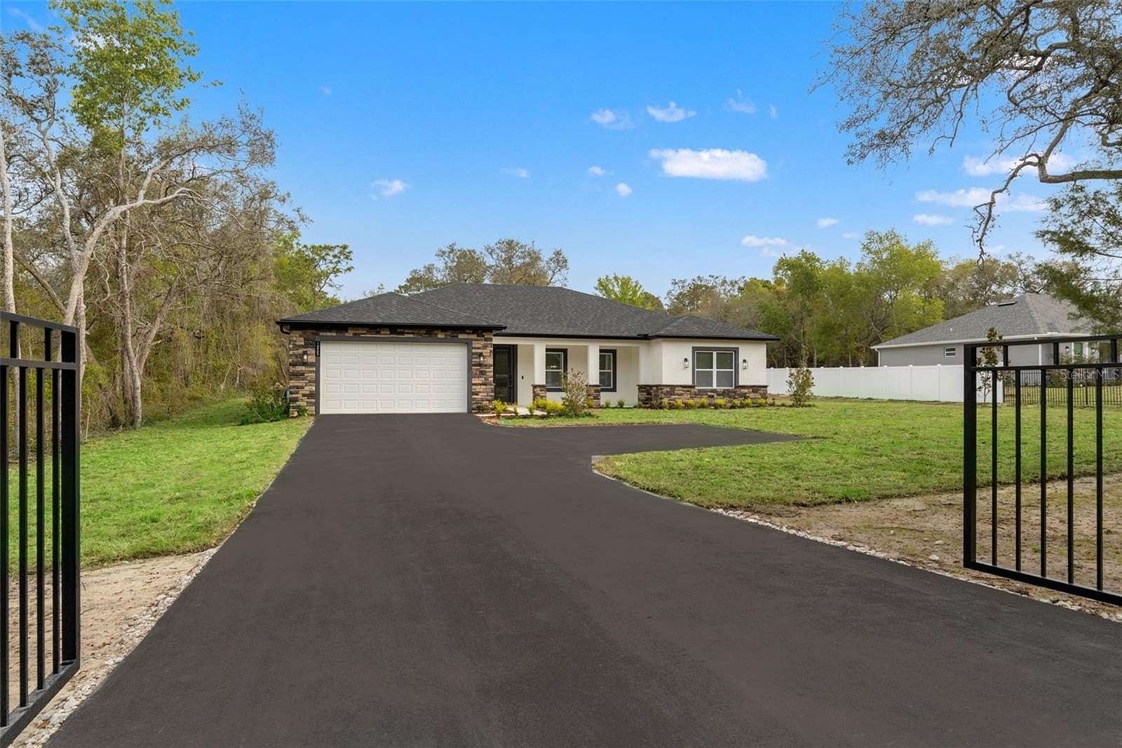 2 Acres of Land with Home for Sale in Spring Hill, Florida