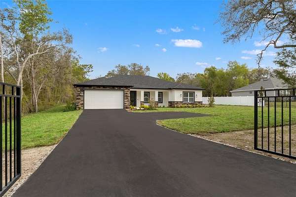 2 Acres of Land with Home for Sale in Spring Hill, Florida