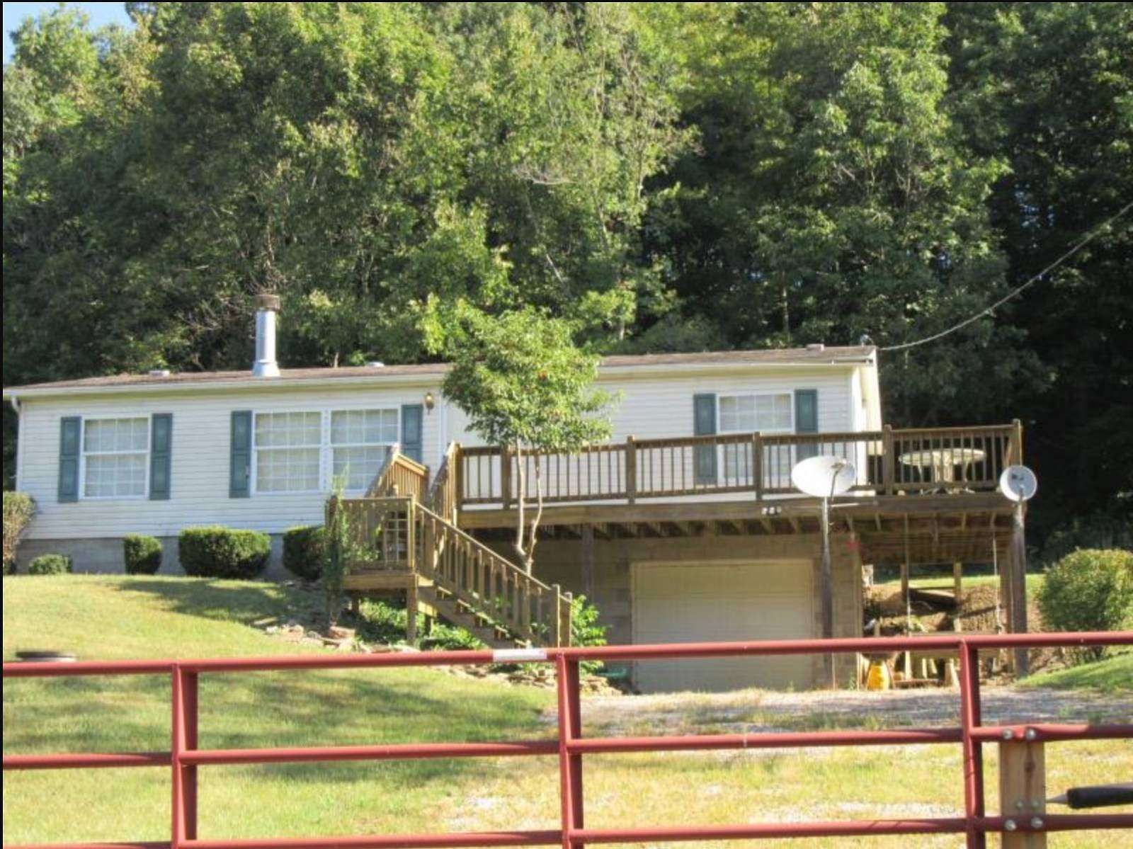 8 Acres of Land with Home for Auction in Chandlersville, Ohio