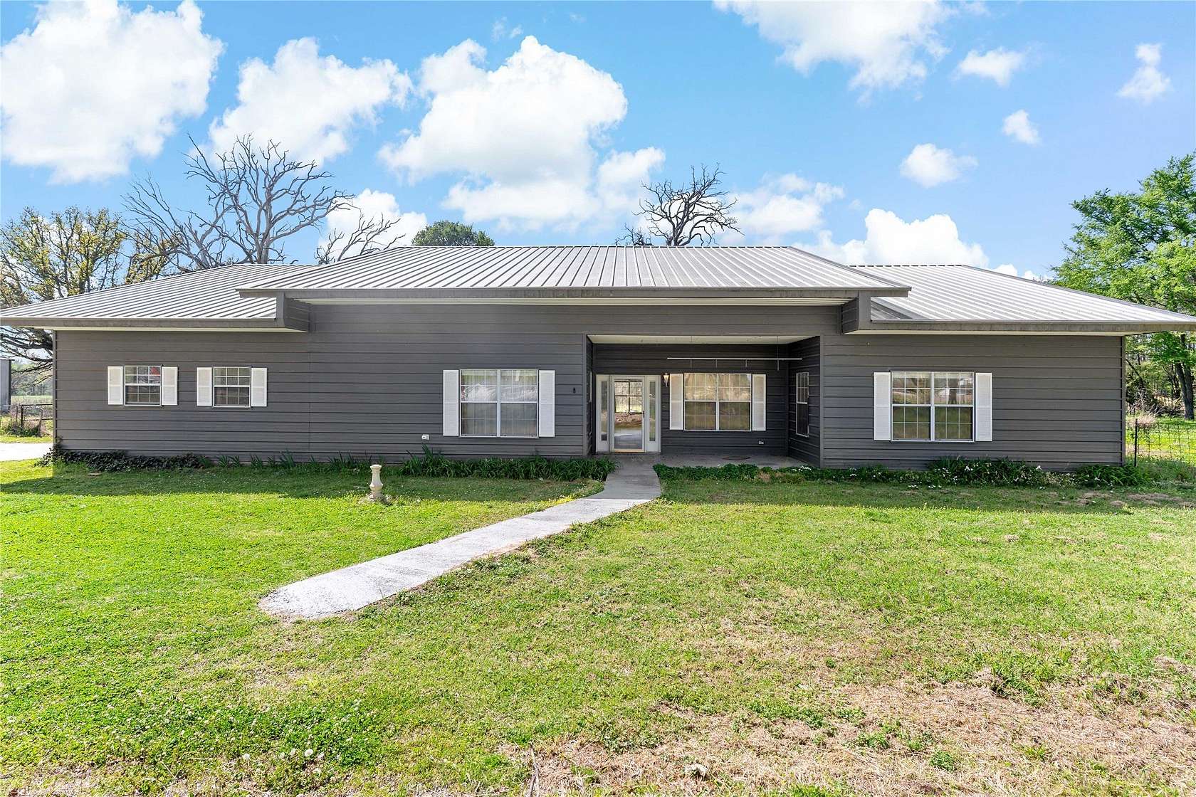 11.7 Acres of Land with Home for Sale in Paris, Texas