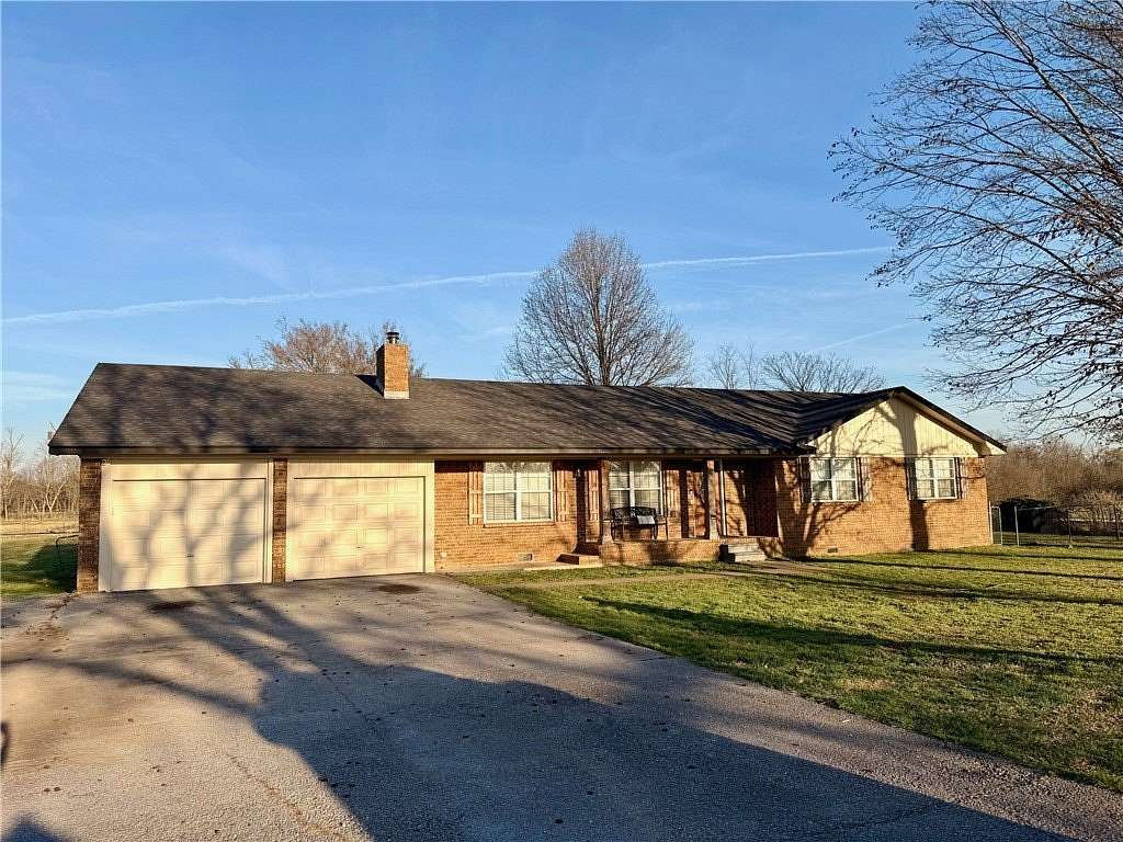 1.58 Acres of Land with Home for Sale in Prairie Grove, Arkansas