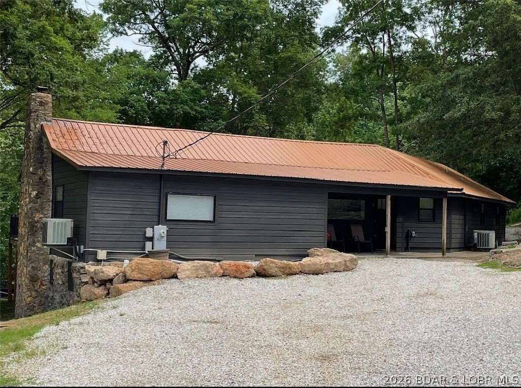 1.63 Acres of Land with Home for Sale in Gravois Mills, Missouri