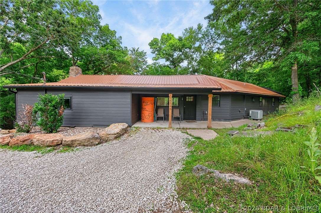 1.63 Acres of Land with Home for Sale in Gravois Mills, Missouri