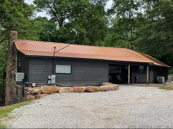 1.63 Acres of Land with Home for Sale in Gravois Mills, Missouri