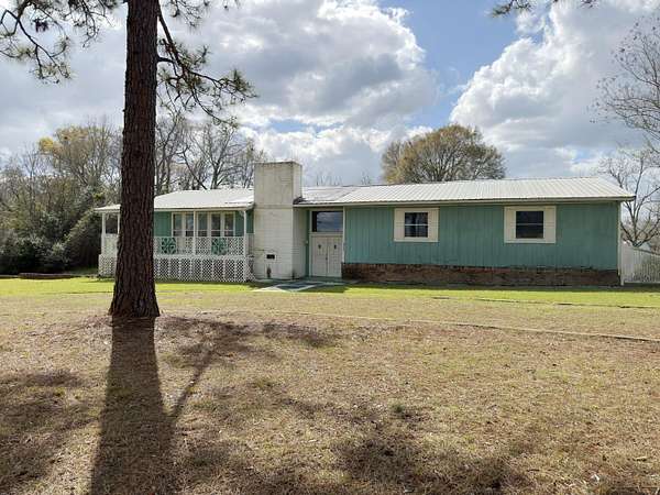 2.13 Acres of Land with Home for Sale in Laurel Hill, Florida