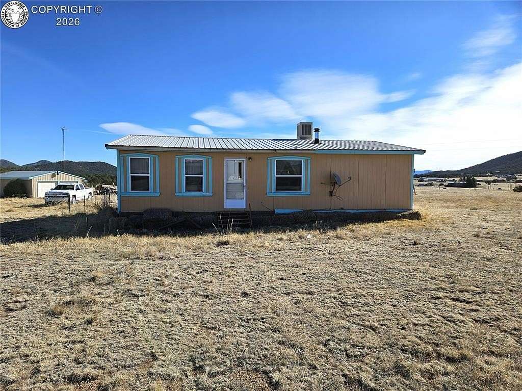 2.43 Acres of Land with Home for Sale in Cotopaxi, Colorado