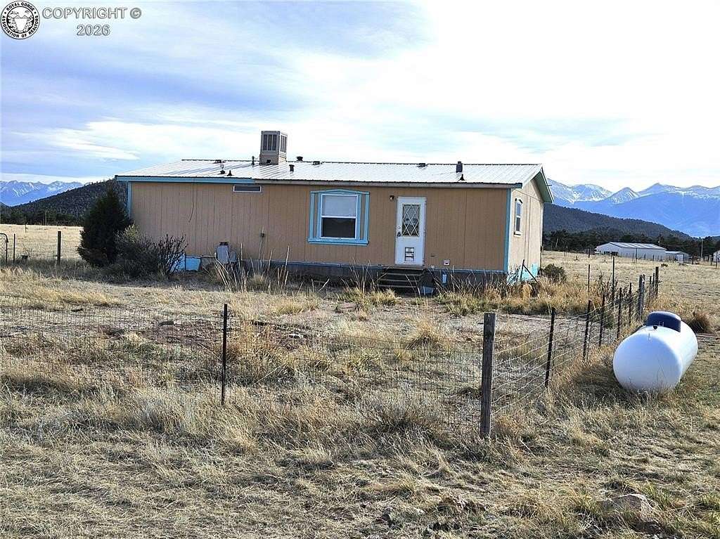 2.43 Acres of Land with Home for Sale in Cotopaxi, Colorado