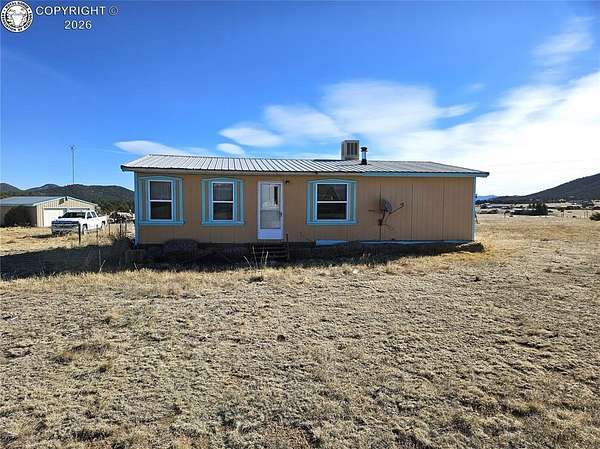 2.43 Acres of Land with Home for Sale in Cotopaxi, Colorado