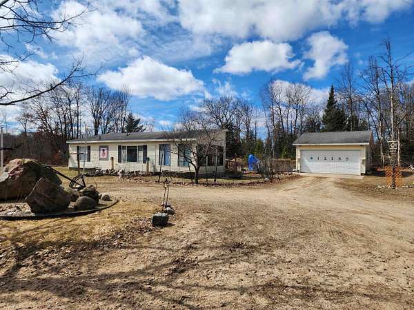 3.9 Acres of Land with Home for Sale in Marion, Michigan