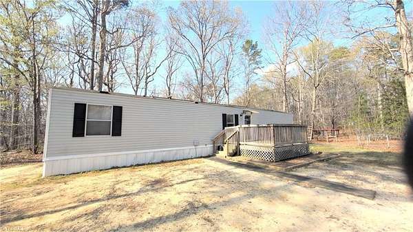 1.56 Acres of Land with Home for Sale in Troy, North Carolina