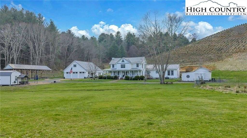 20.8 Acres of Land with Home for Sale in Lansing, North Carolina