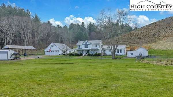 20.8 Acres of Land with Home for Sale in Lansing, North Carolina