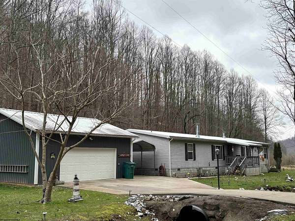 128 Acres of Recreational Land with Home for Sale in West Union, West Virginia