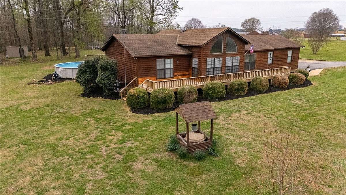 8.9 Acres of Land with Home for Sale in Loretto, Tennessee