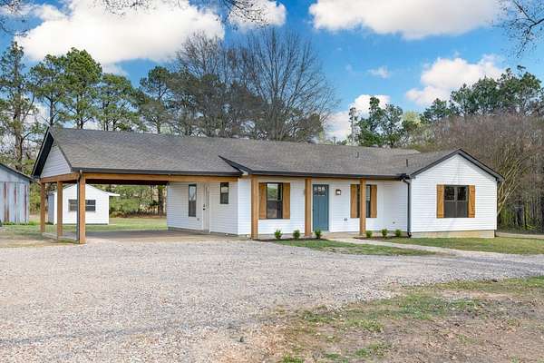 5 Acres of Land with Home for Sale in Mason, Tennessee