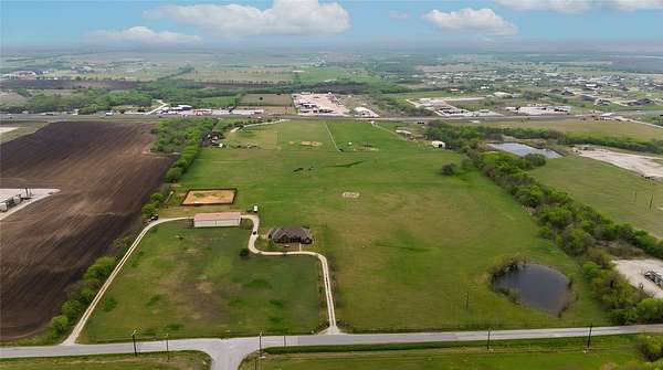 26.5 Acres of Agricultural Land with Home for Sale in Krum, Texas
