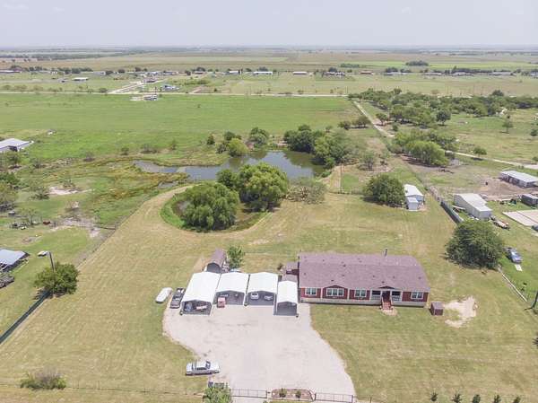4 Acres of Land with Home for Sale in Pilot Point, Texas