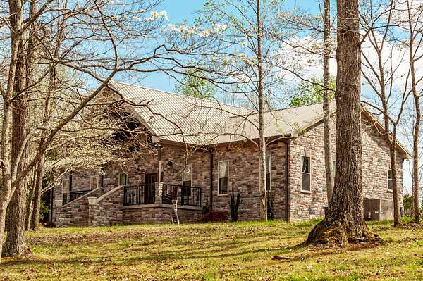 18.5 Acres of Recreational Land with Home for Sale in Bethpage, Tennessee