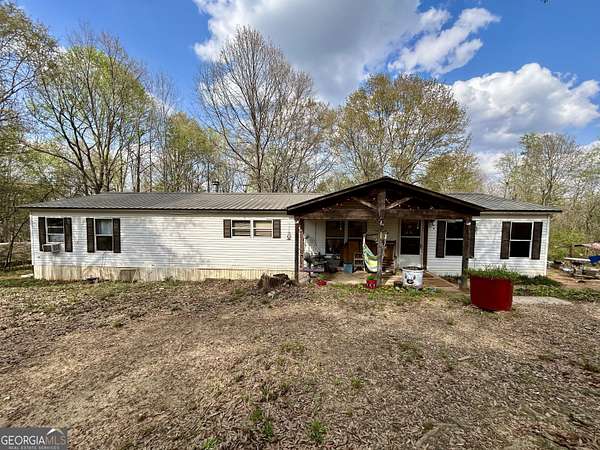 6.53 Acres of Land with Home for Sale in Royston, Georgia