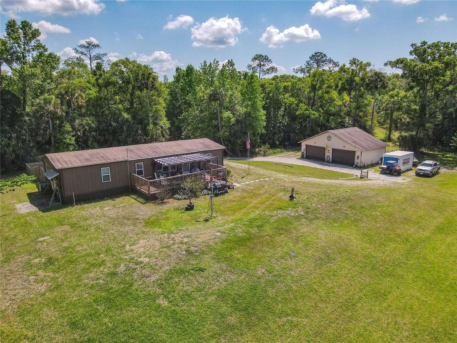 25.4 Acres of Recreational Land with Home for Sale in Osteen, Florida