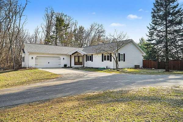 14 Acres of Recreational Land with Home for Sale in Augusta, Michigan